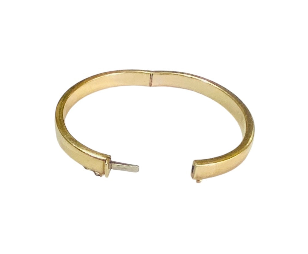 9ct preowned plain bangle. 11.2g yellow gold . Hollow