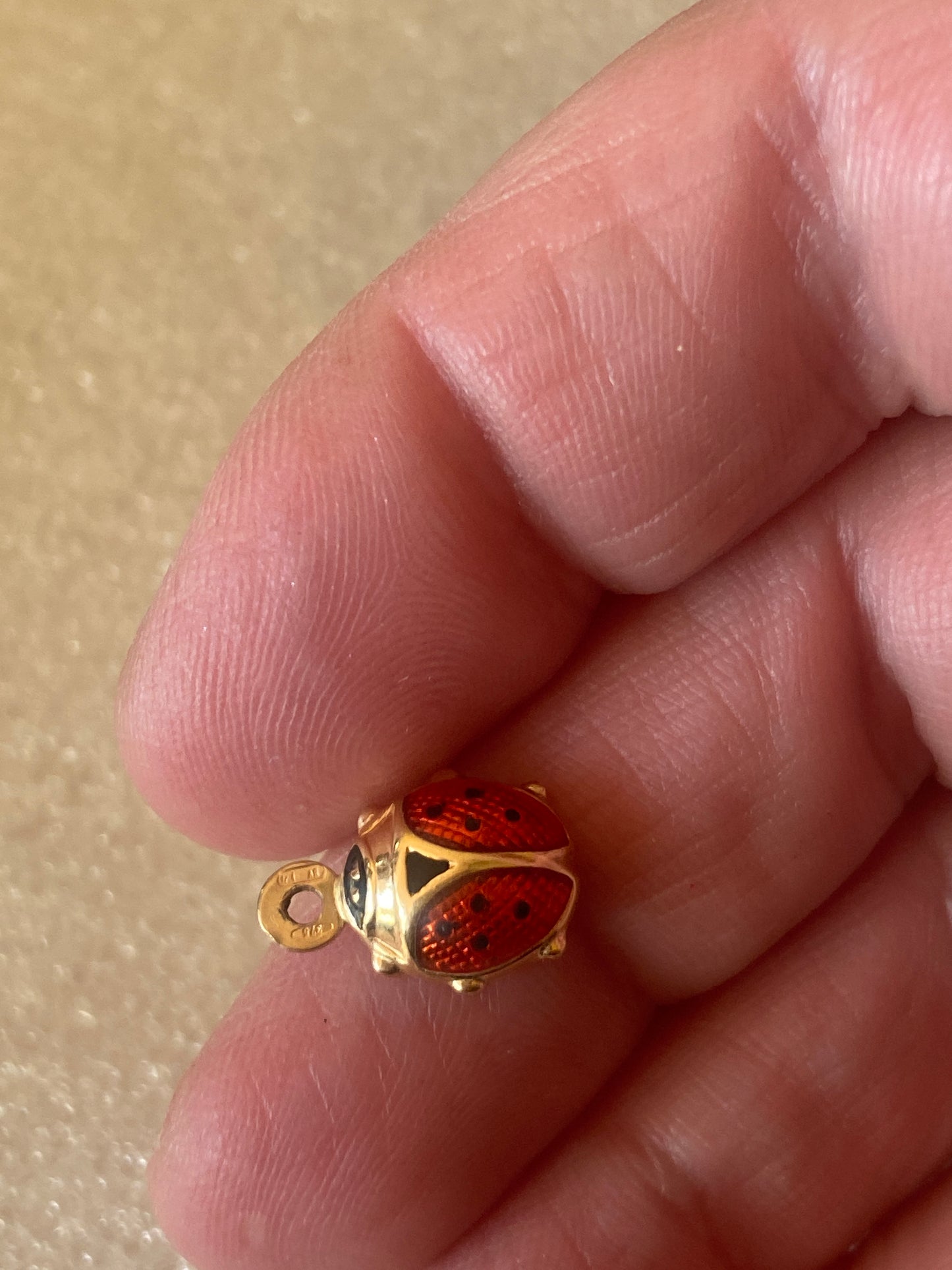 9ct pre owned lady bird charm. enamelled.