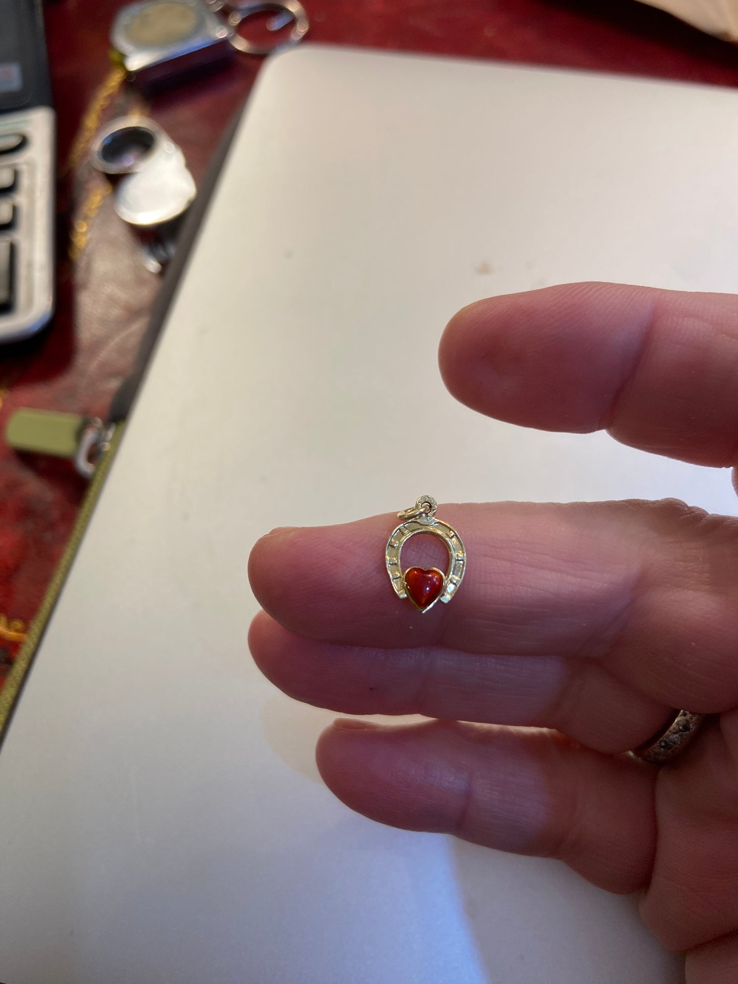 14ct vintage horseshoe with red enamel heart . 585