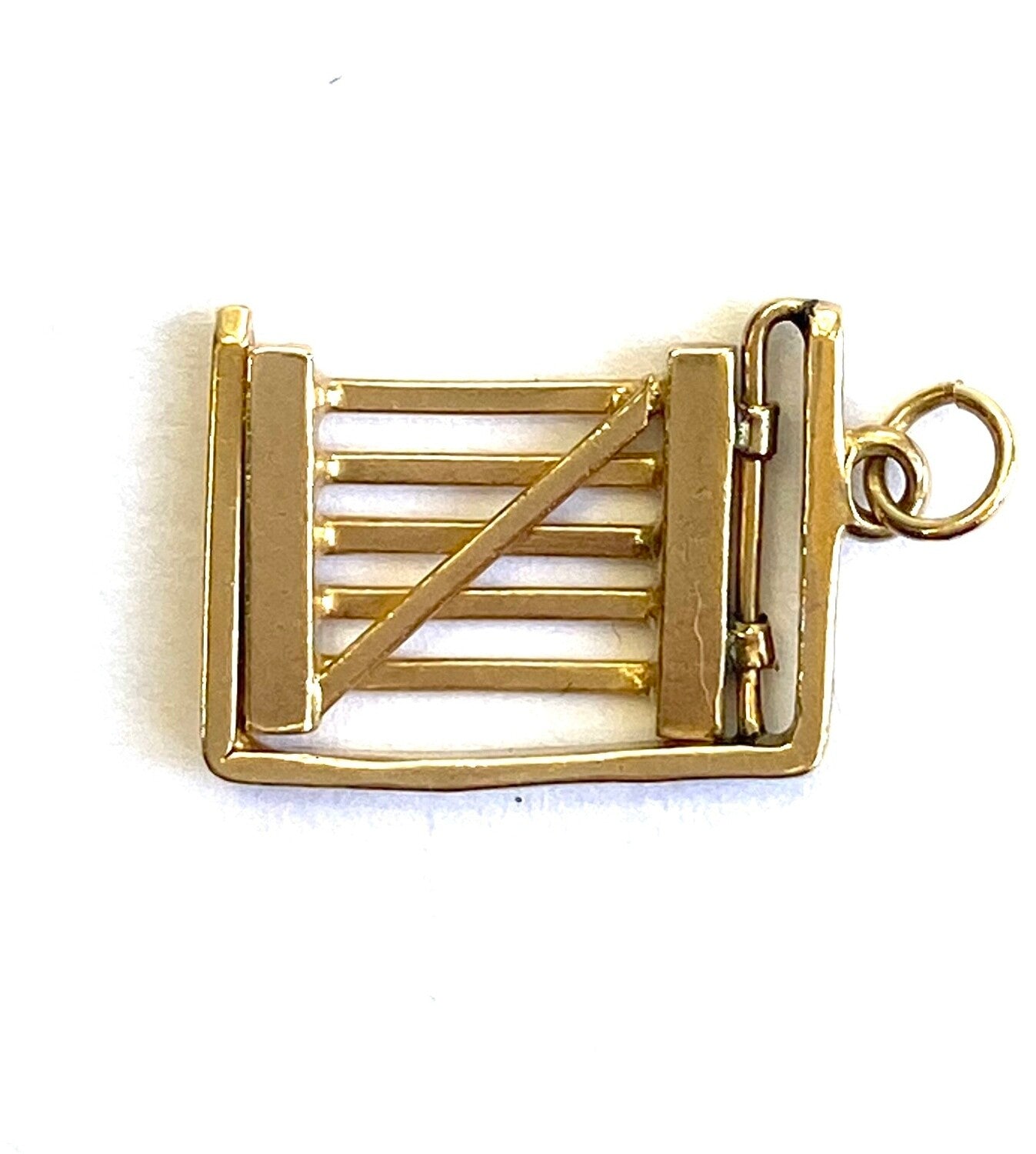 9ct vintage opening gate charm circa 1948 by Crop and Farr