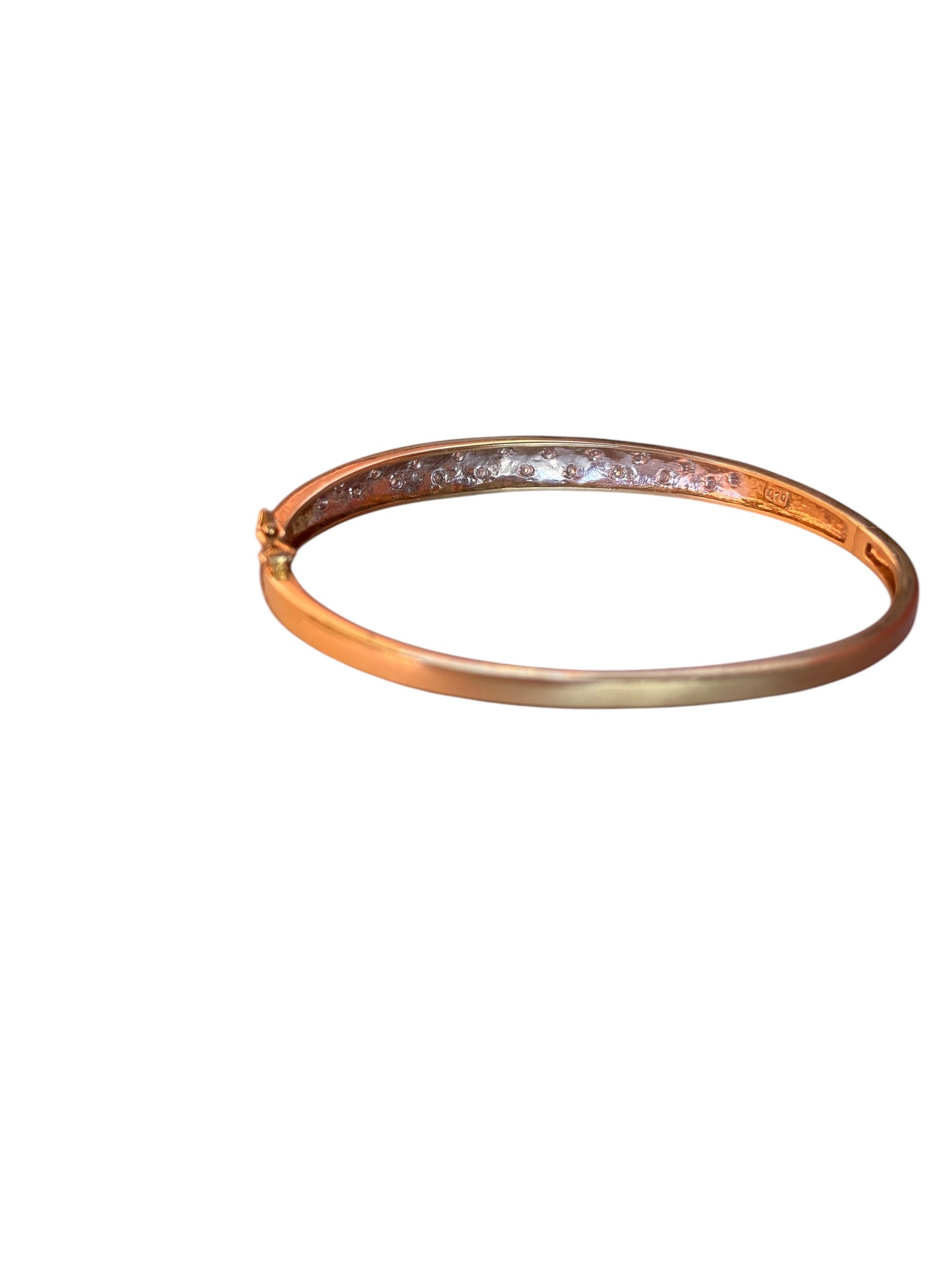 9ct vintage diamond bangle. illusion set 11.g