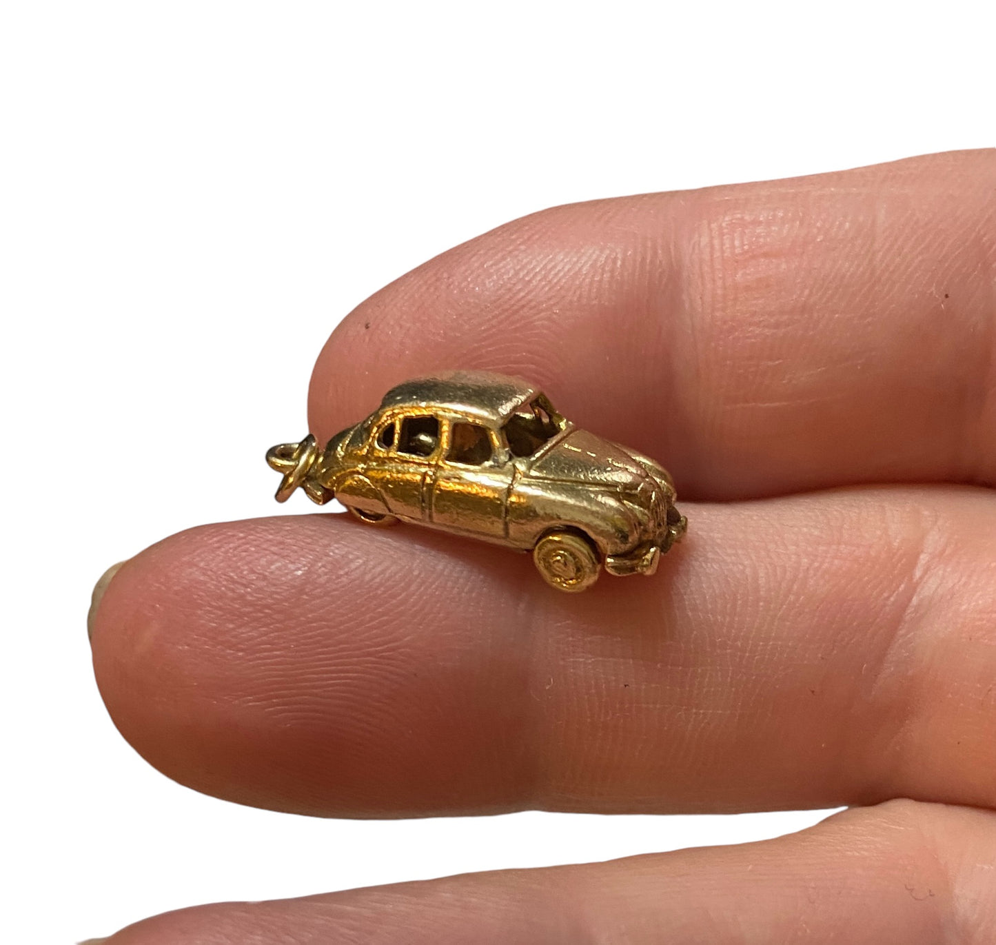 9ct vintage Jaguar car, circa 1961 with moving wheels