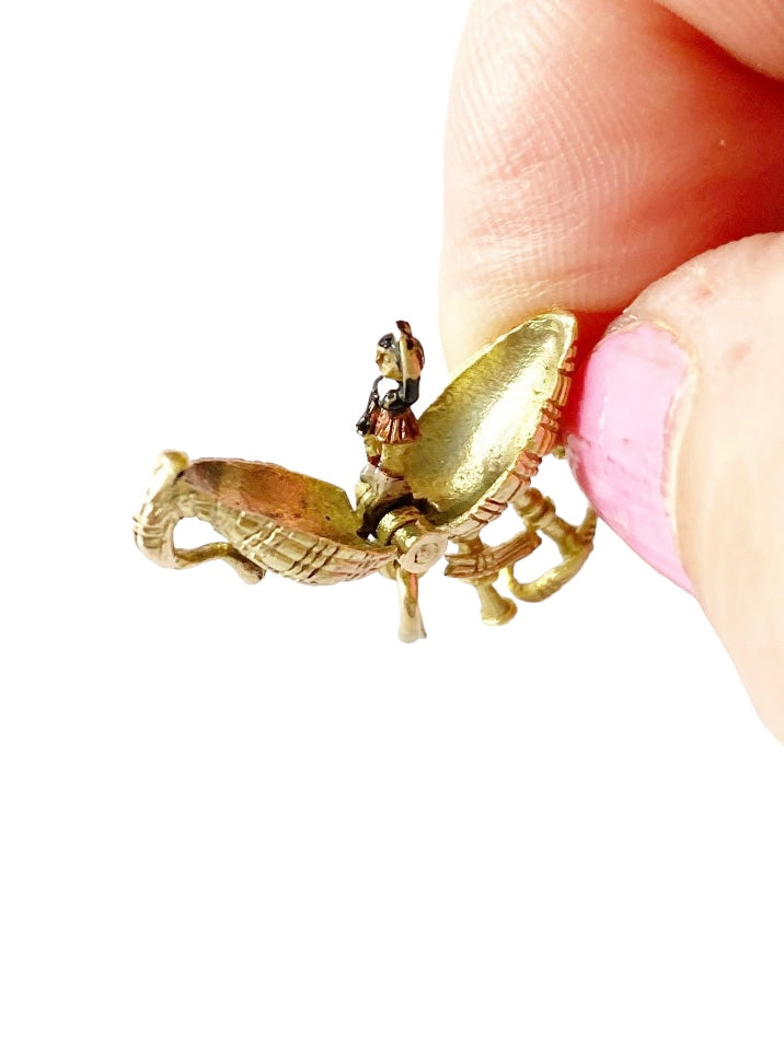 9ct vintage bagpipe charm opening to reveal an enamelled highland dancer