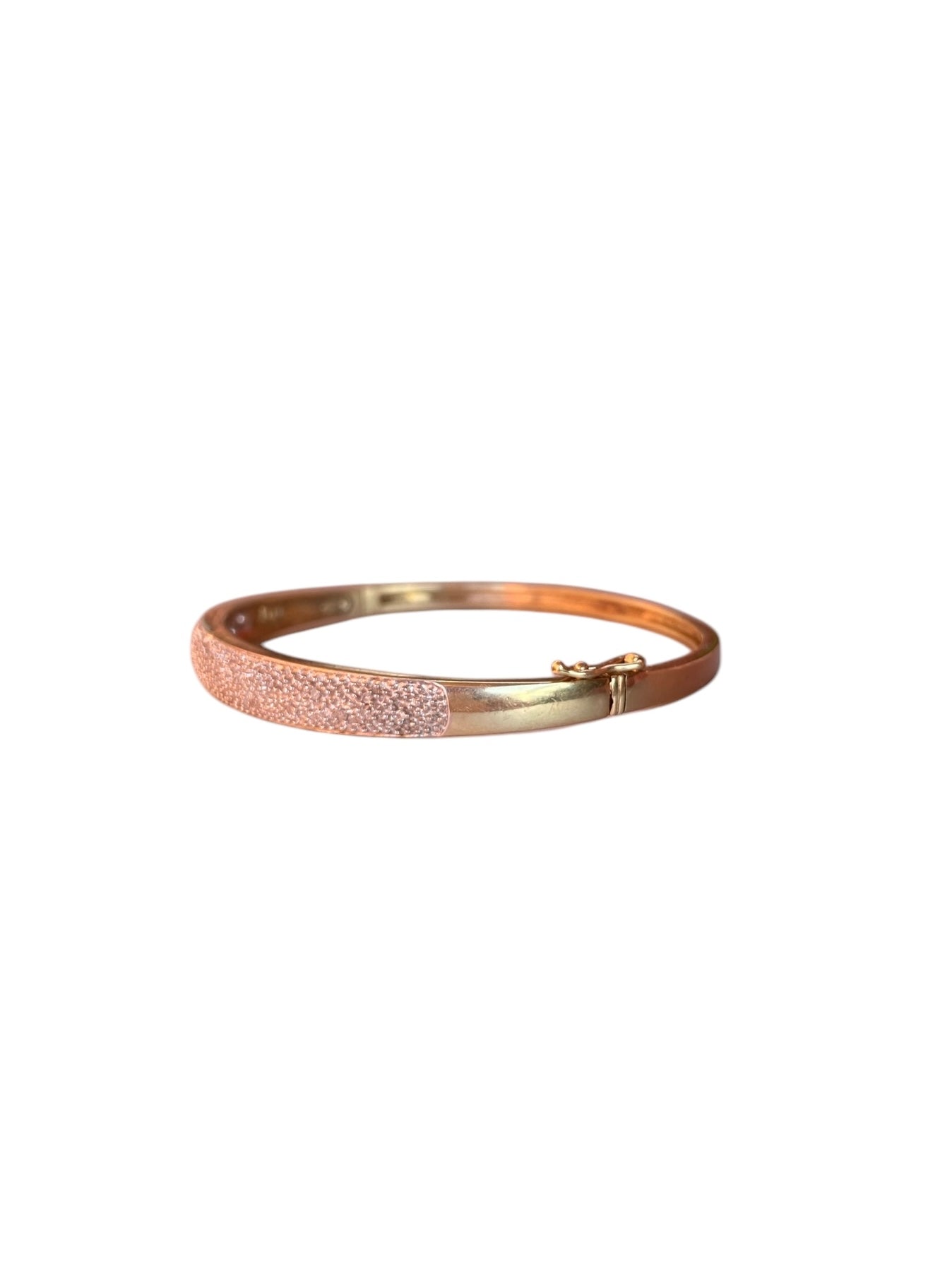 9ct vintage diamond bangle. illusion set 11.g