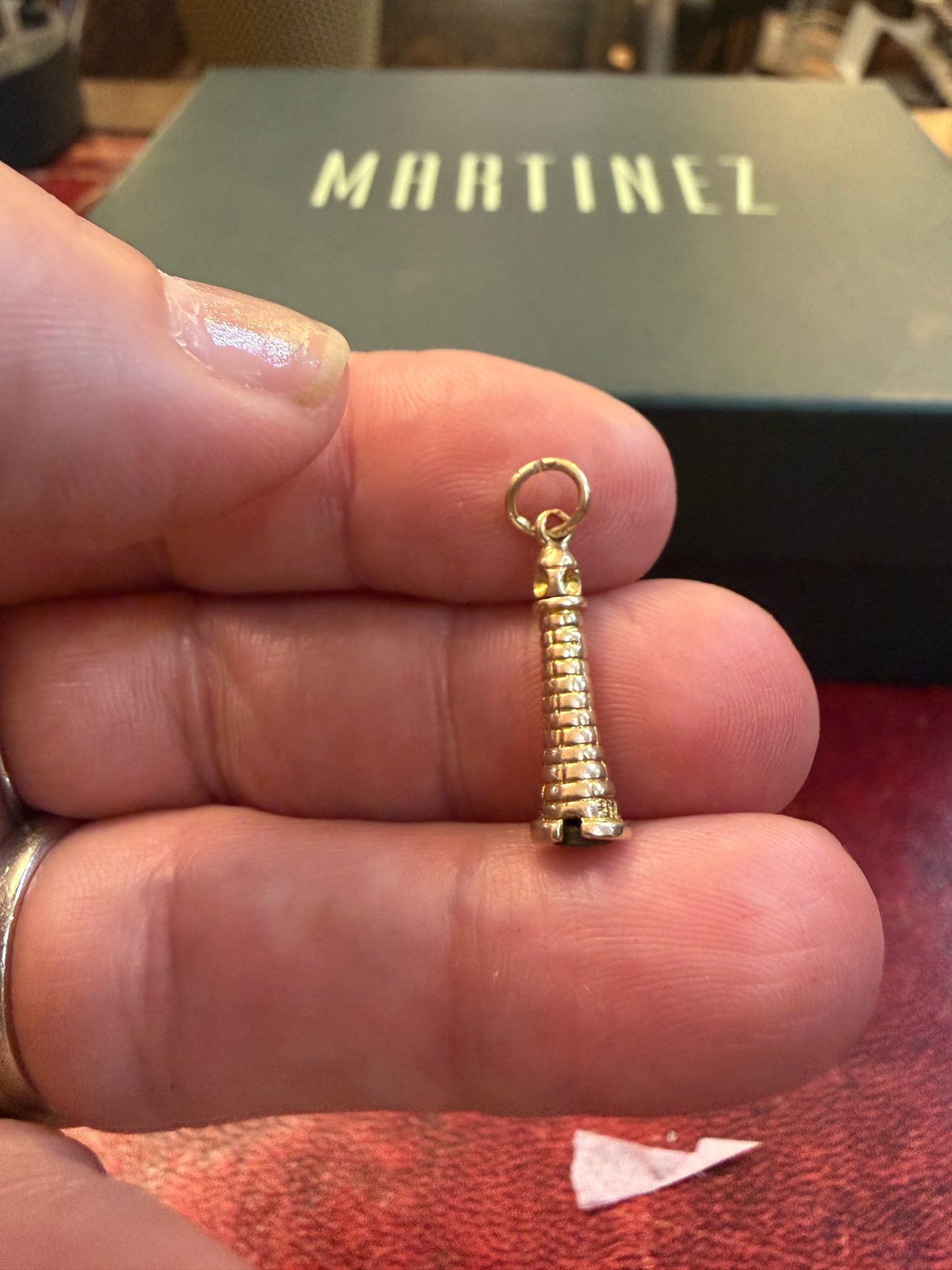9ct vintage lighthouse charm with rotating feral. circa 1958 by FM 1.4g