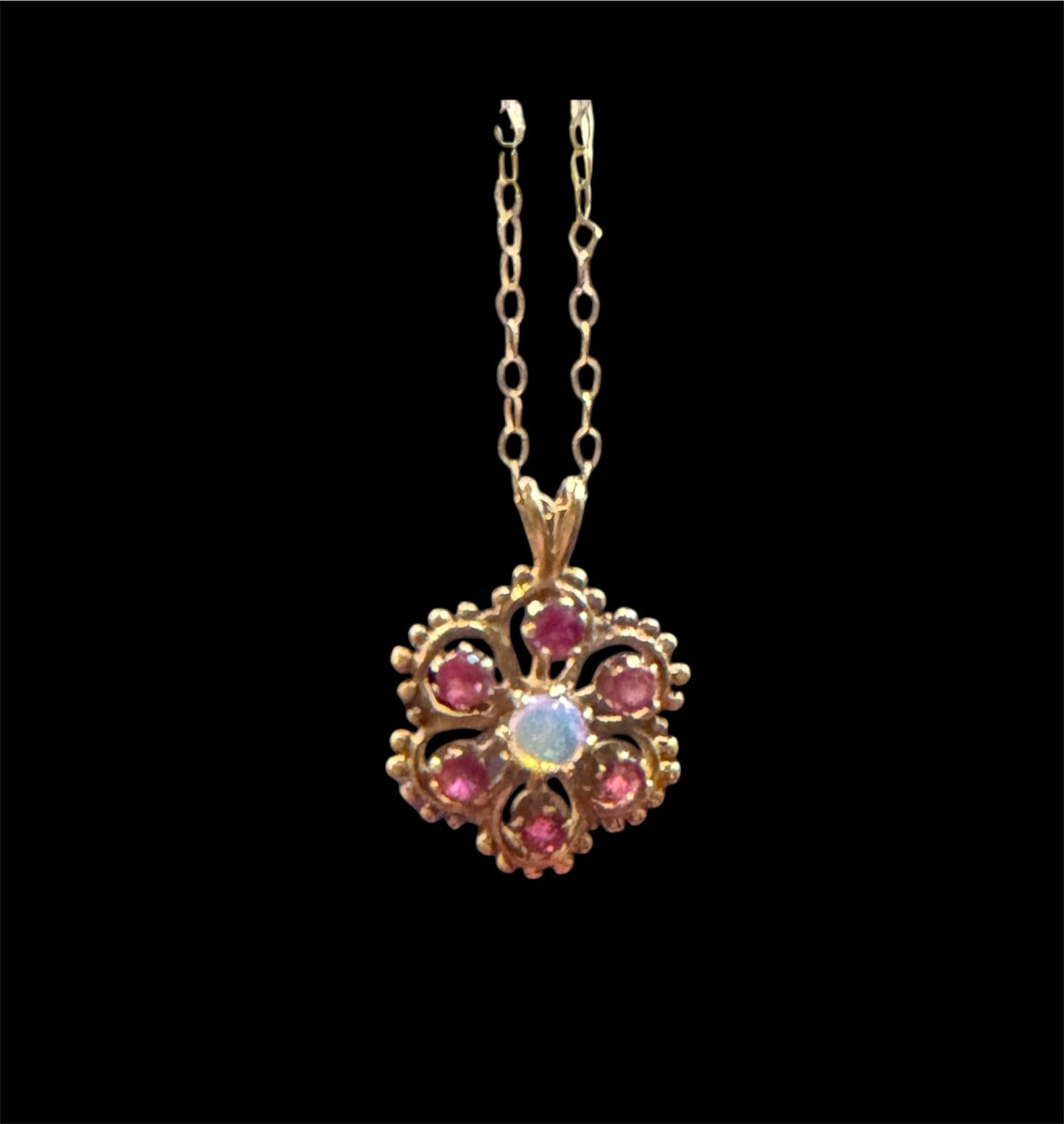 9ct vintage ruby and diamond pendant on 16 1/2 inch chain. (41cm)