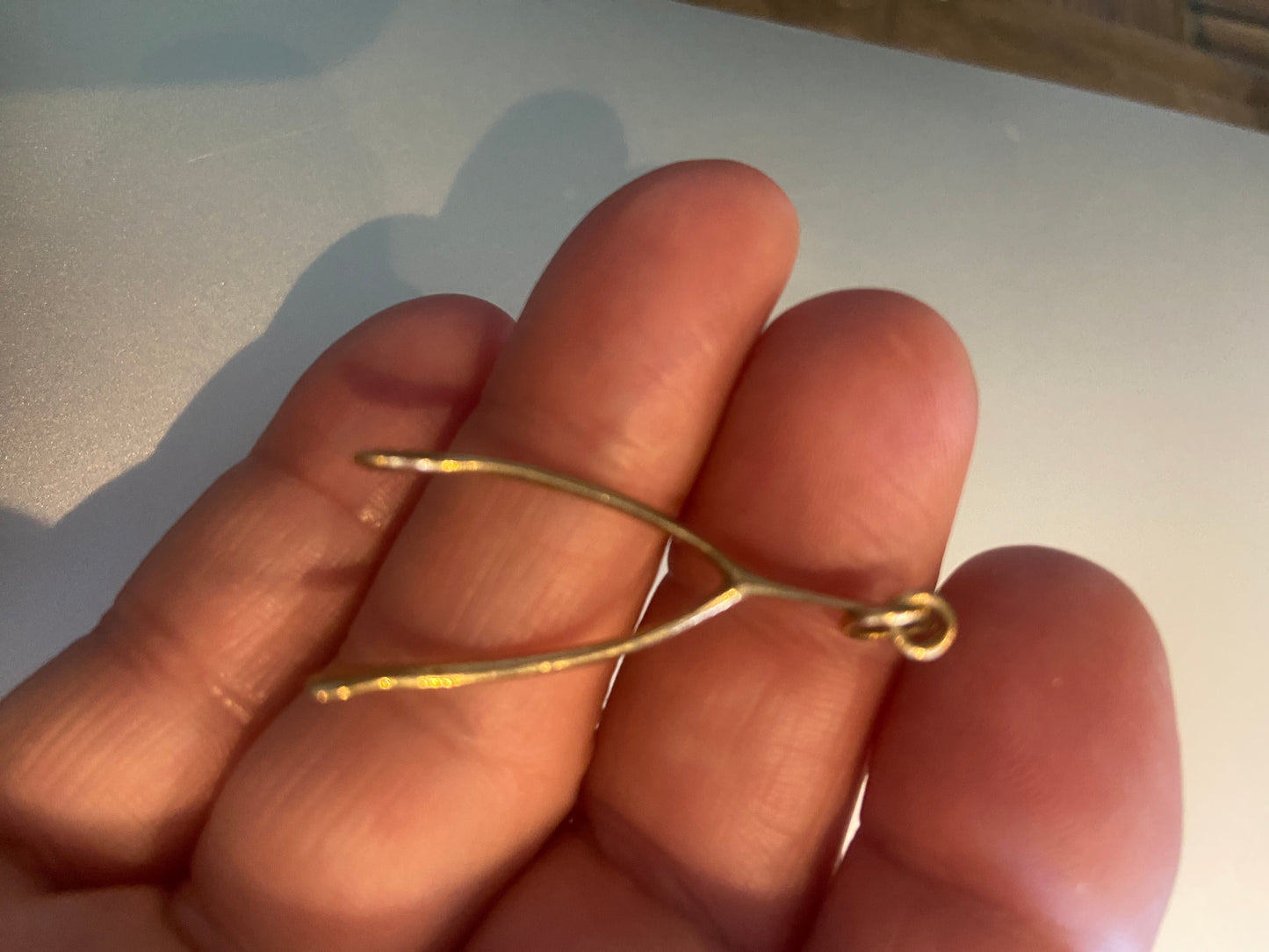 9ct vintage wishbone charm. circa 1958