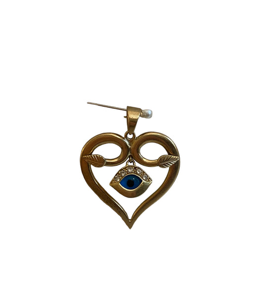 9ct pre owned evil eye pendant in a gold heart. 9.6g