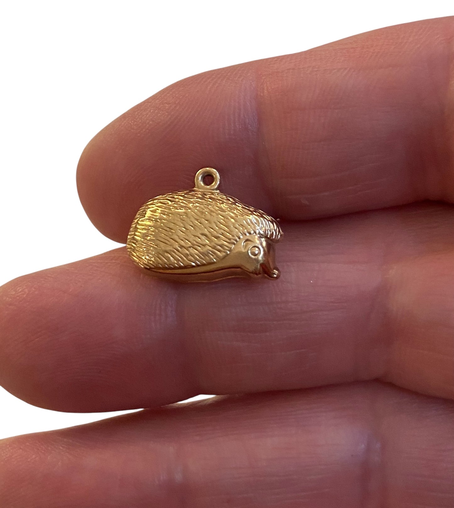 9ct vintage hedgehog charm , small and hollow 0.5g