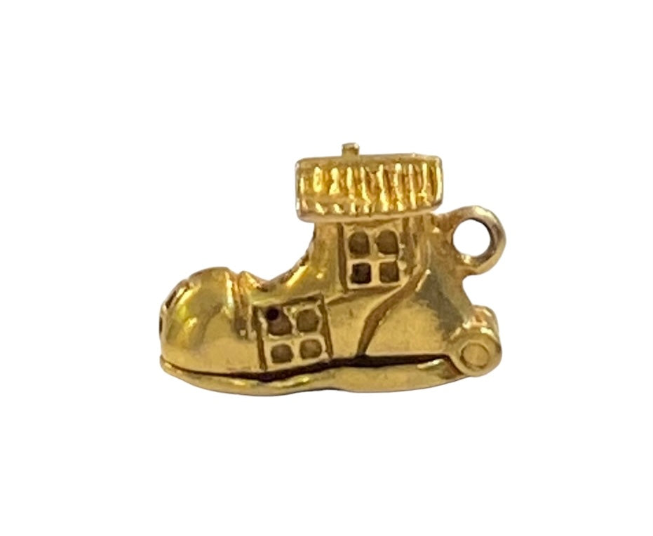 9ct vintage shoe charm opening with old lady and children. by Georg Jensen circa 1962