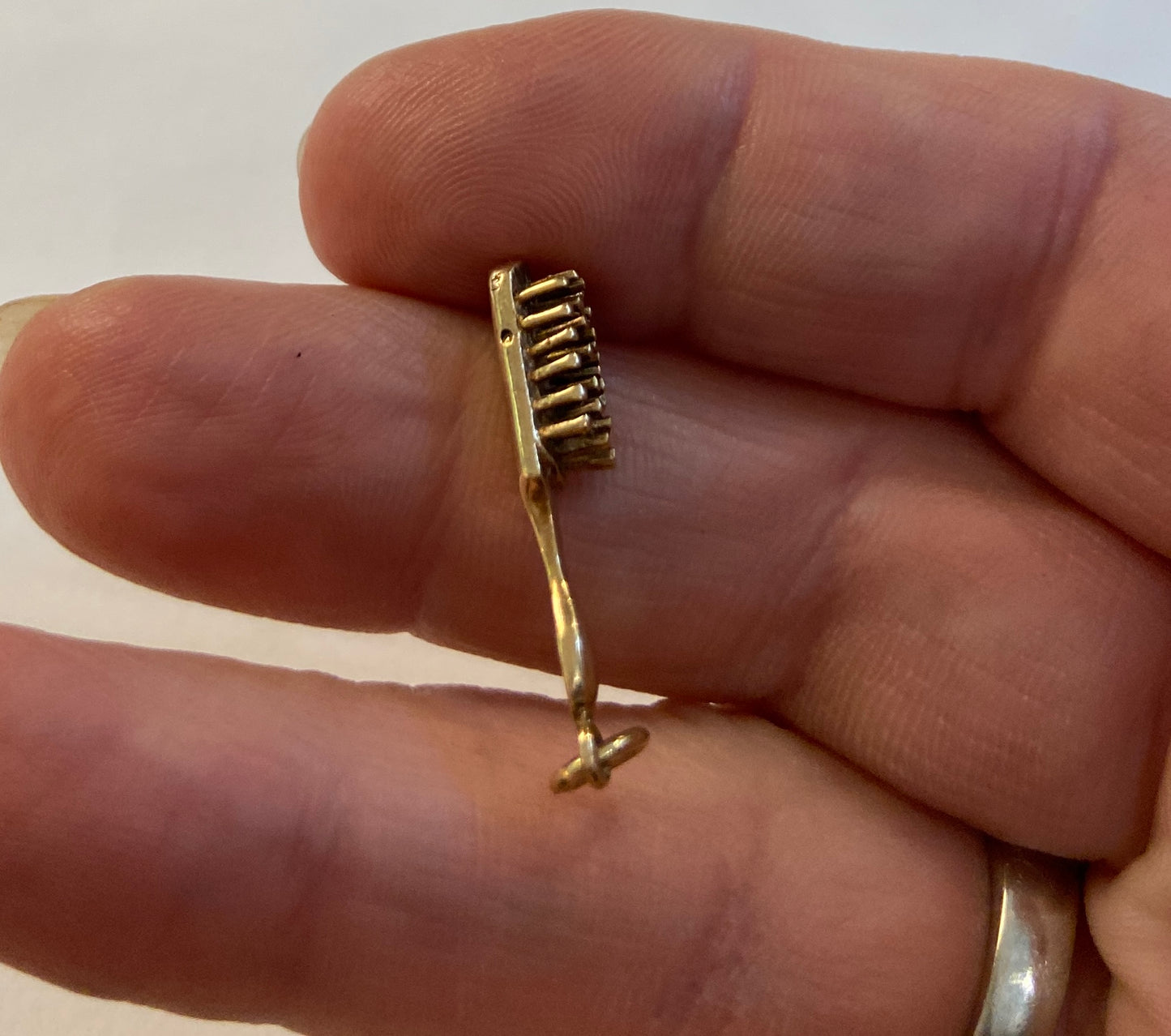 9ct vintage brush charm circa 1976 by ACCo