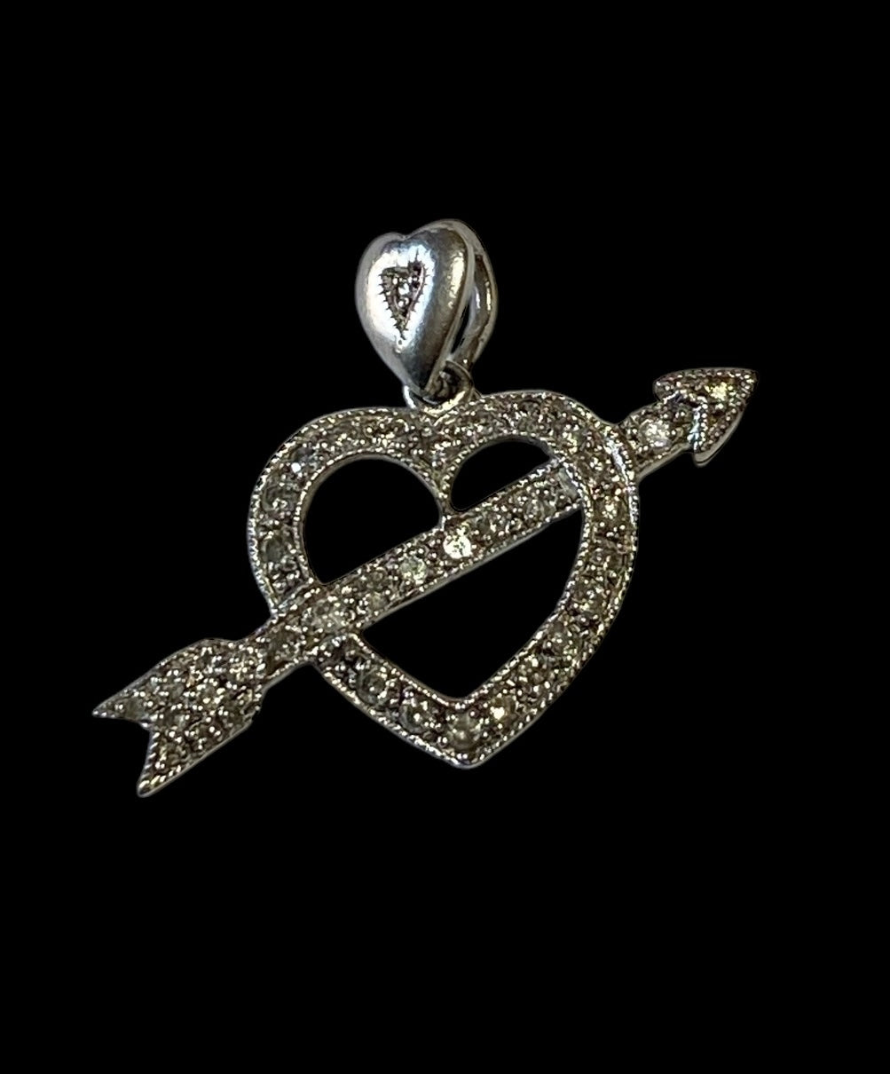 platinum 950 diamond heart with cupids arrow.