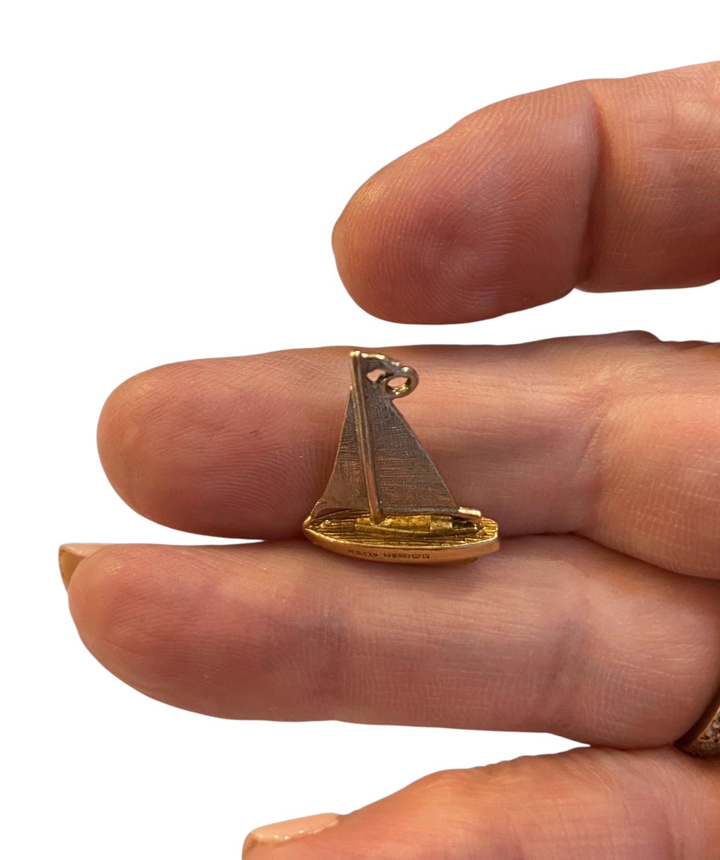 9ct vintage yacht charm, circa 1968. white and yellow gold