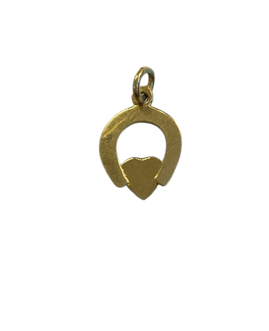14ct vintage horseshoe with red enamel heart . 585