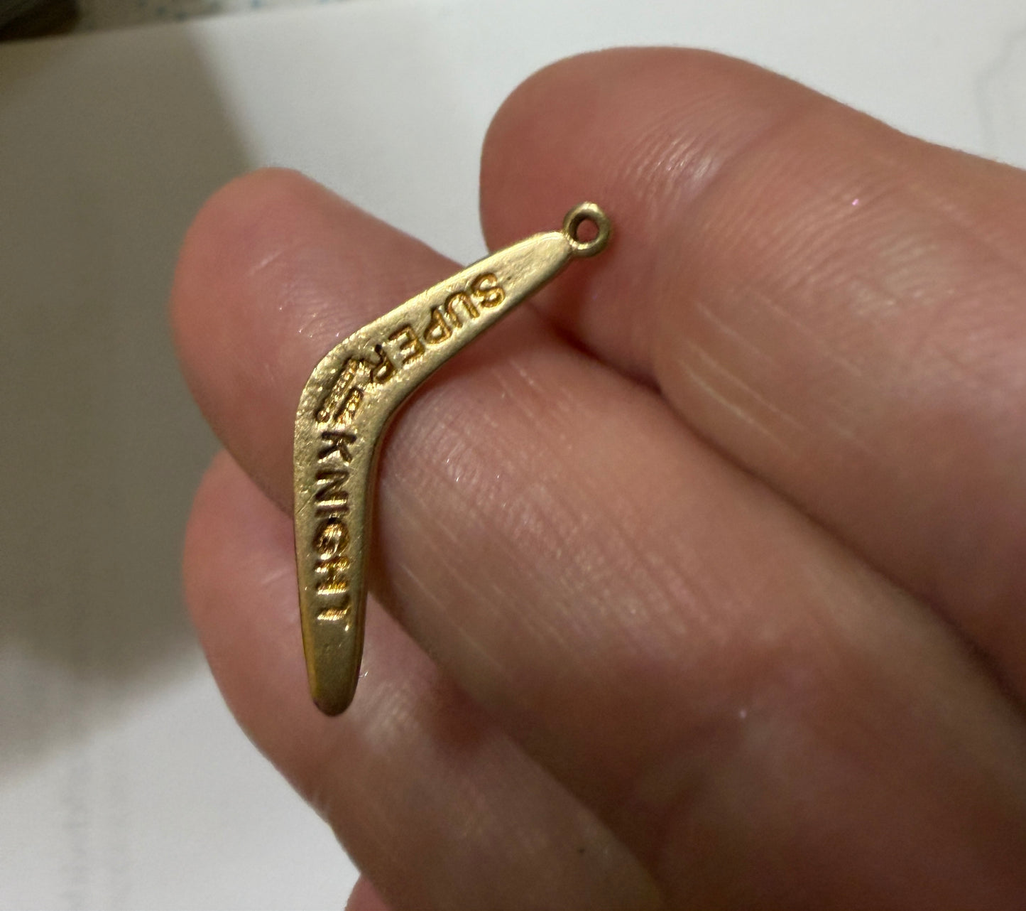 9ct vintage boomerang charm / pendant circa 1967. 1.2g