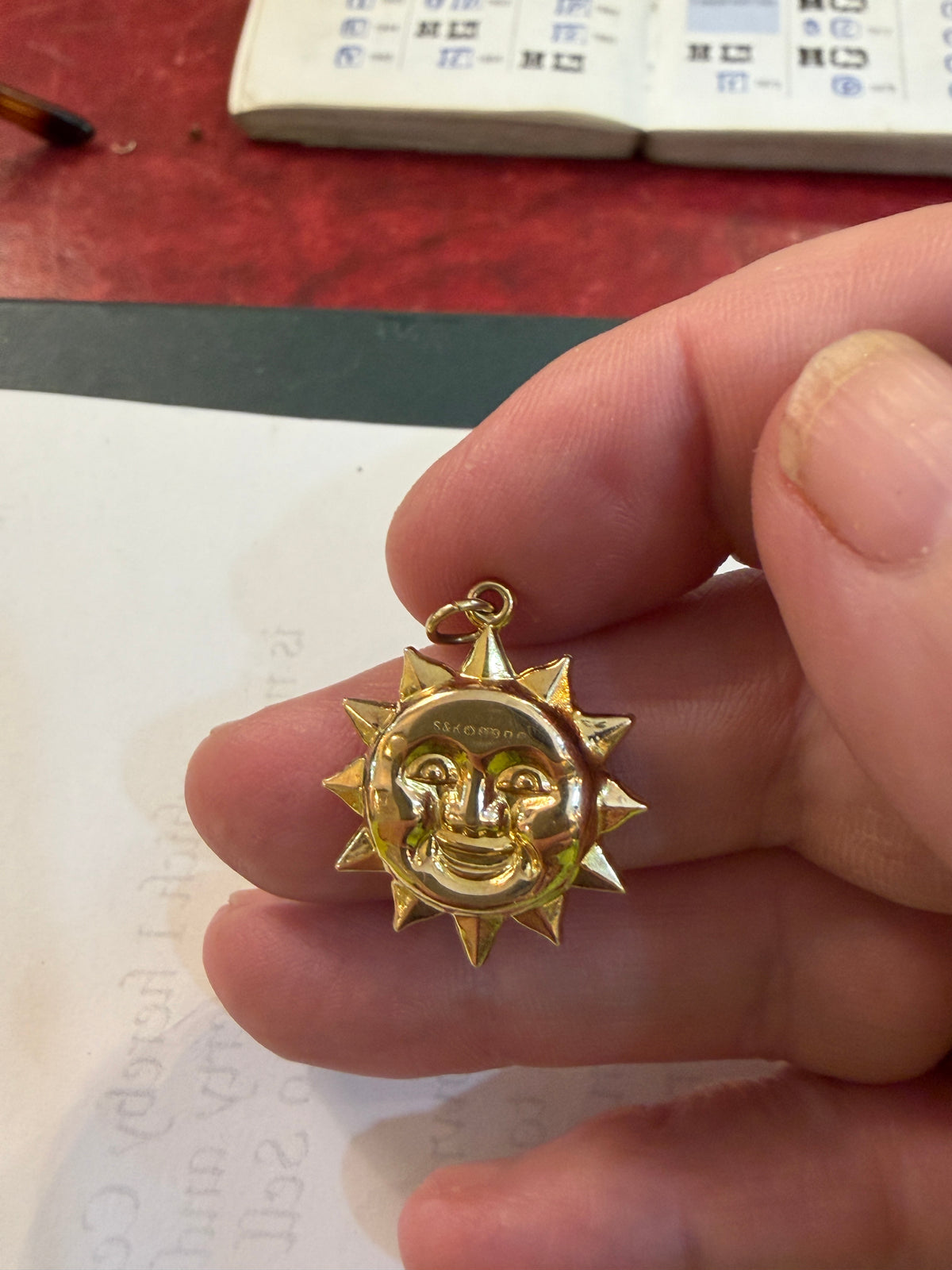 9ct vintage sun charm circa 1976.1.3g HOLLOW.