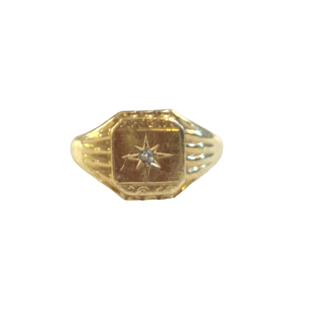 9ct vintage signet ring with a star burst diamond in the centre size R