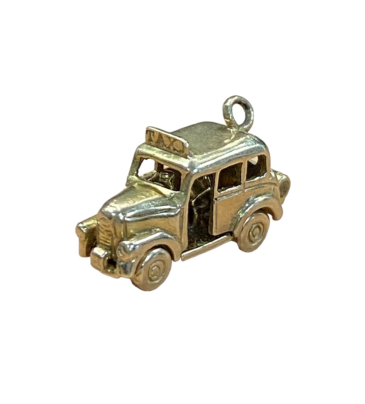 9ct vintage taxi charm opening to reveal some passengers inside circa 1963