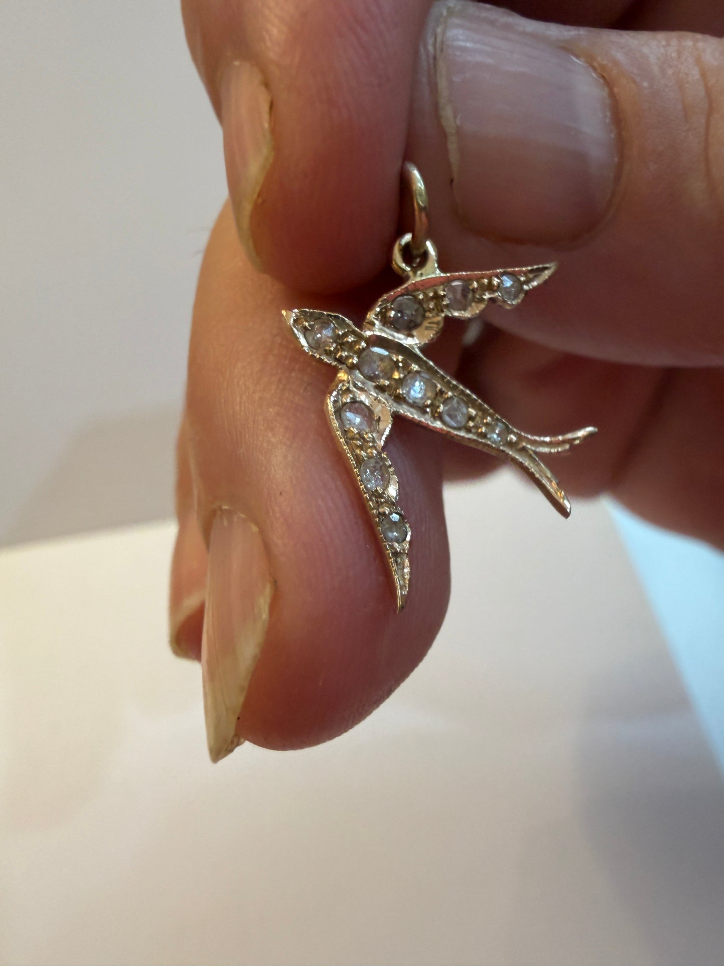 9ct vintage - preowned swallow / dove charm-pendant with rose cut diamonds.