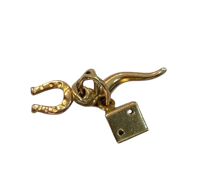 9ct vintage lucy charm with dice, horn of plenty and horseshoe 0.68g