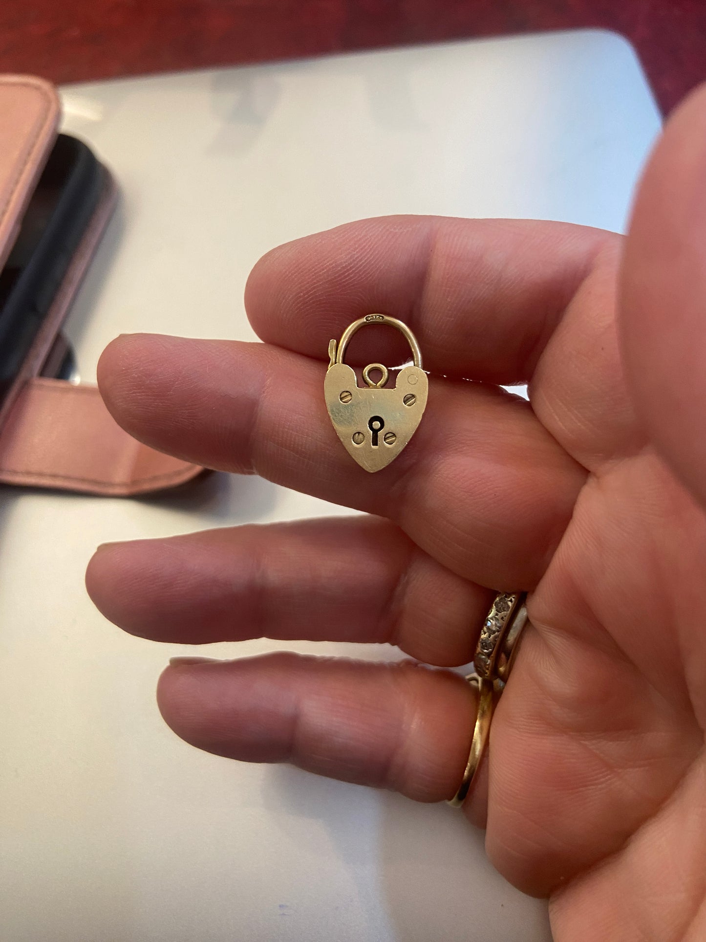 9ct padlock charm circa 1955, yellow gold