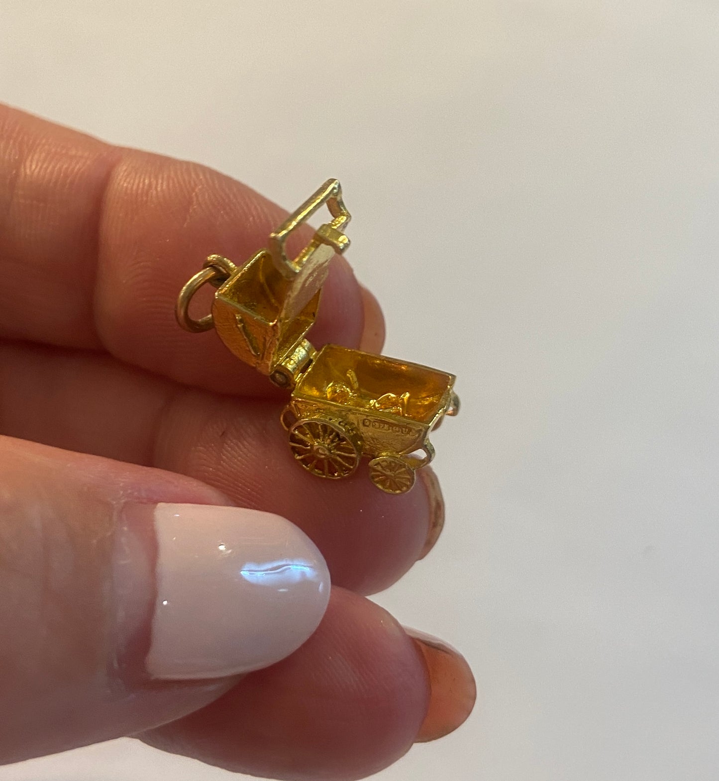 9ct vintage gold opening pram circa 1969