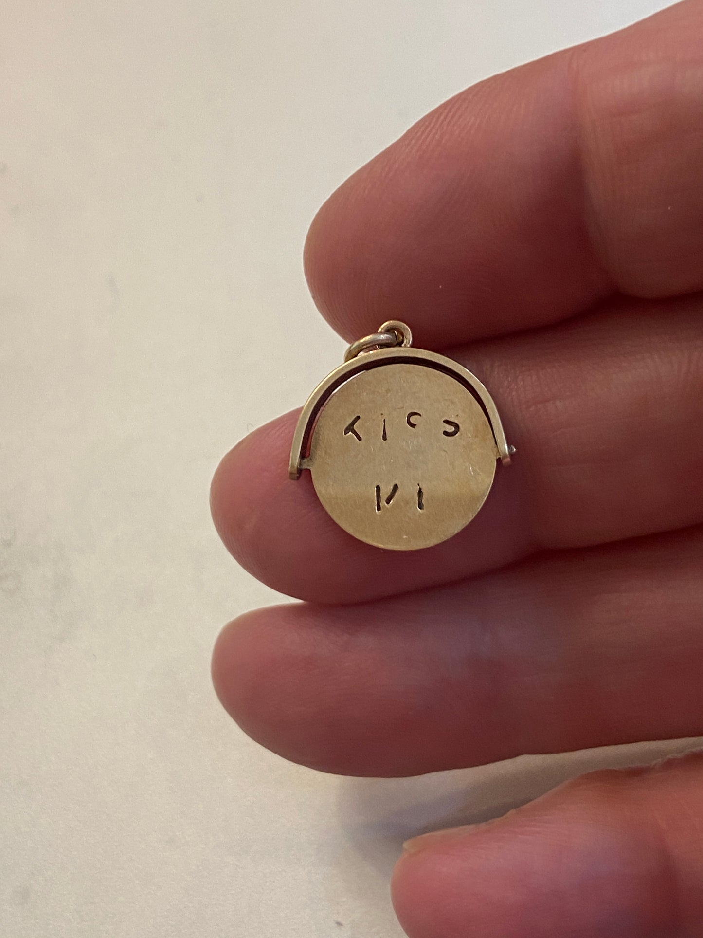 9ct vintage kiss me spinner charm circa chester 1957
