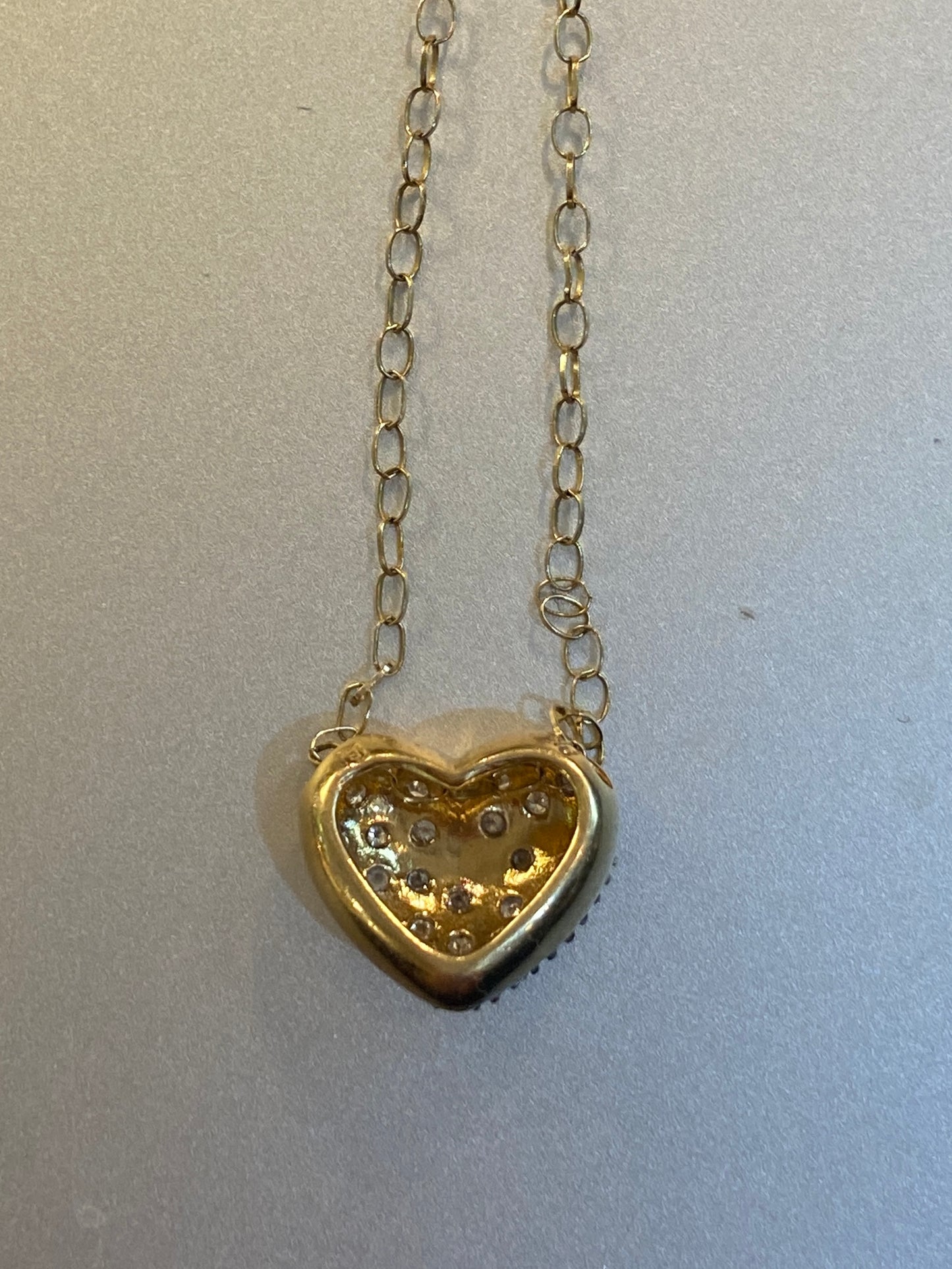 9ct pre owned diamond heart and chain. 16 inches