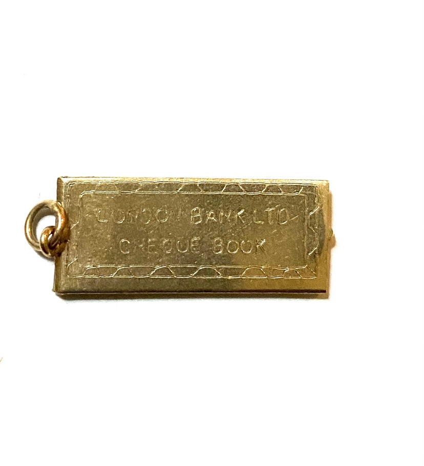 9ct vintage opening cheque book charm, with miniature cheques inside circa 1968