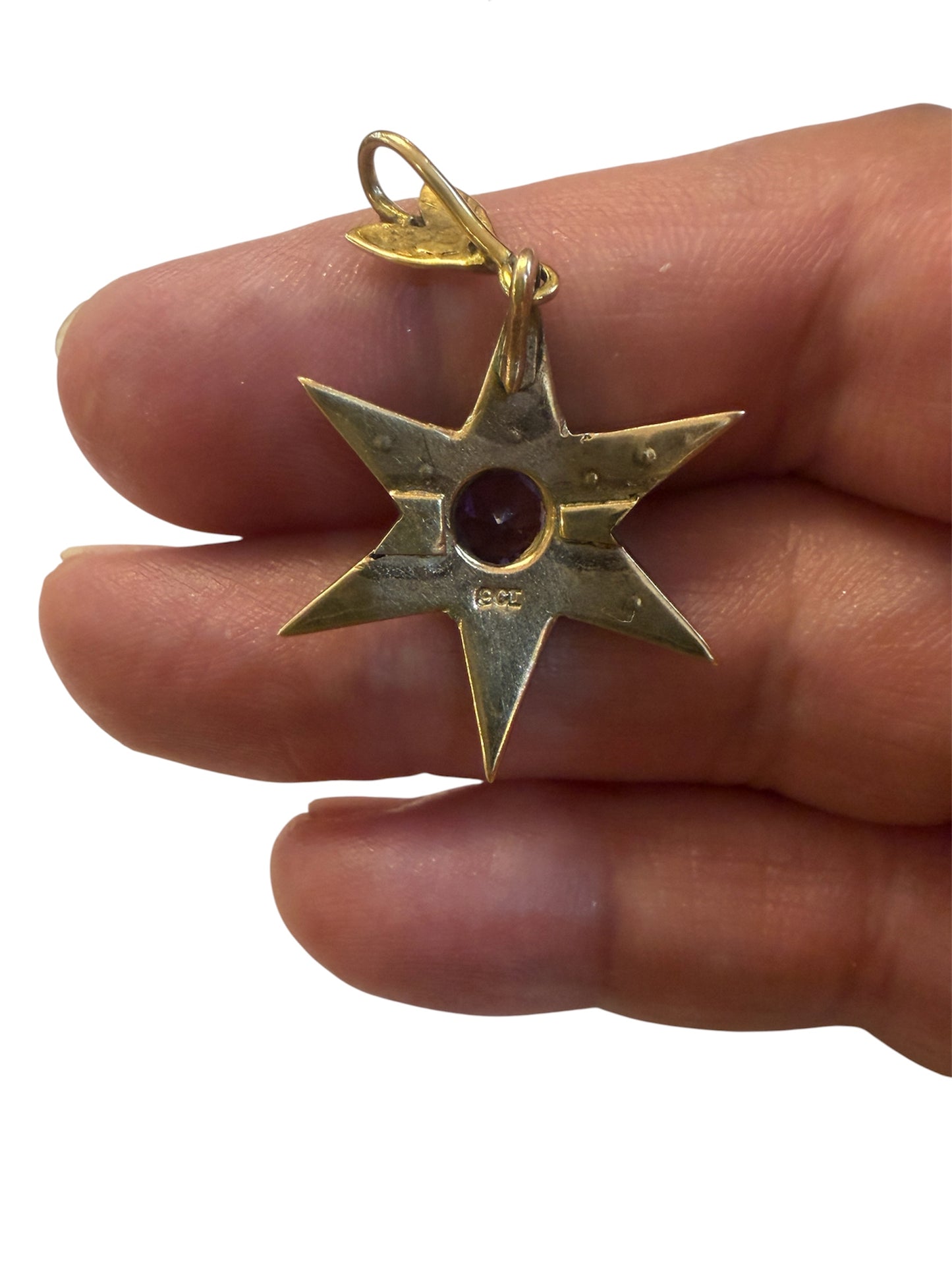 9ct vintage star pendant , with pearls and a central amethyst 3.05g