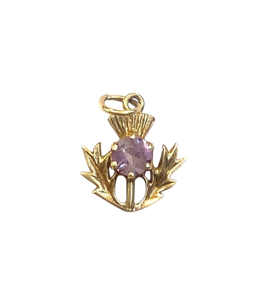 9ct vintage thistle charm with an amethyst. 1.4g