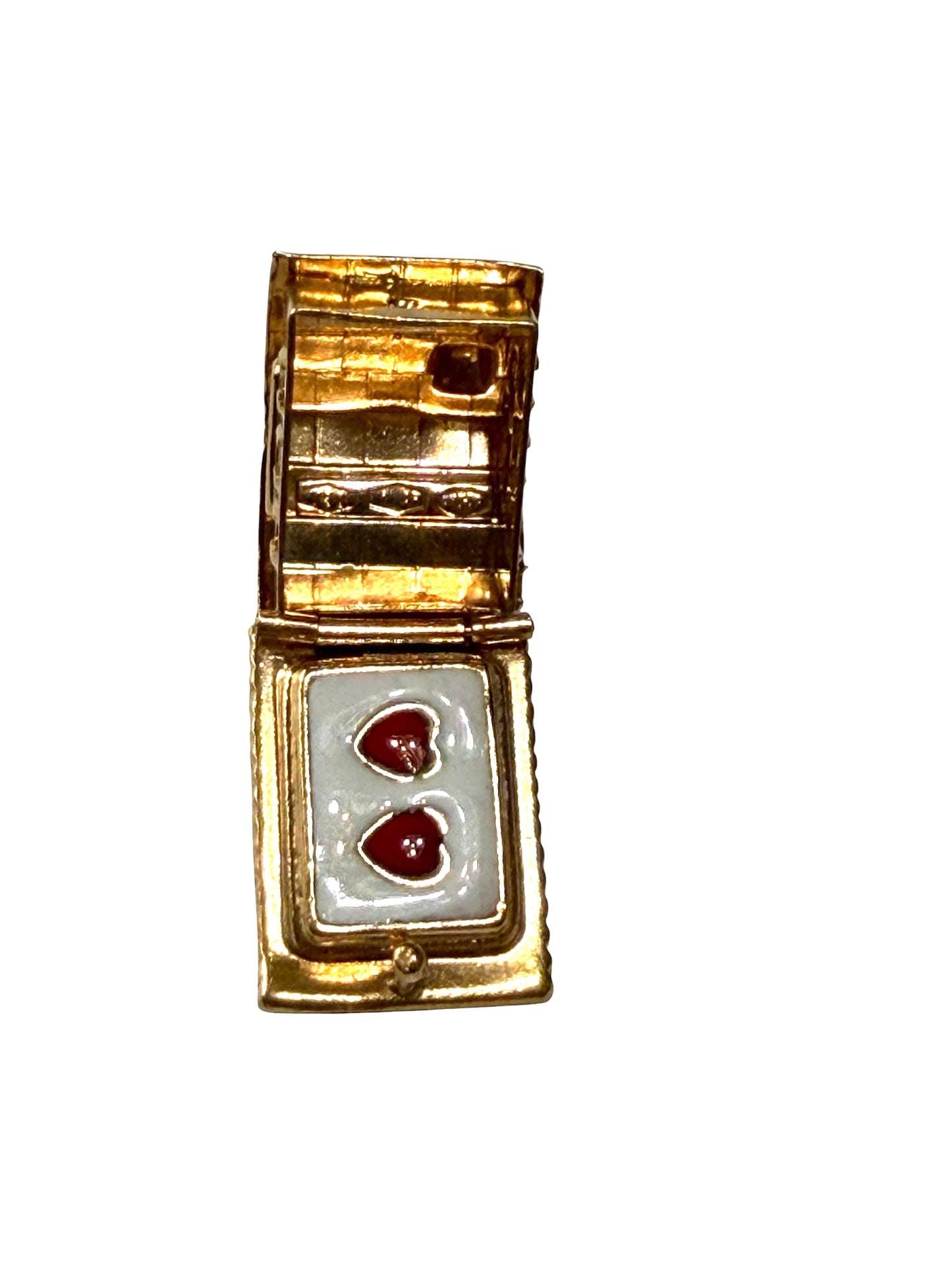 18ct vintage swiss chalet charm with two hearts inside.