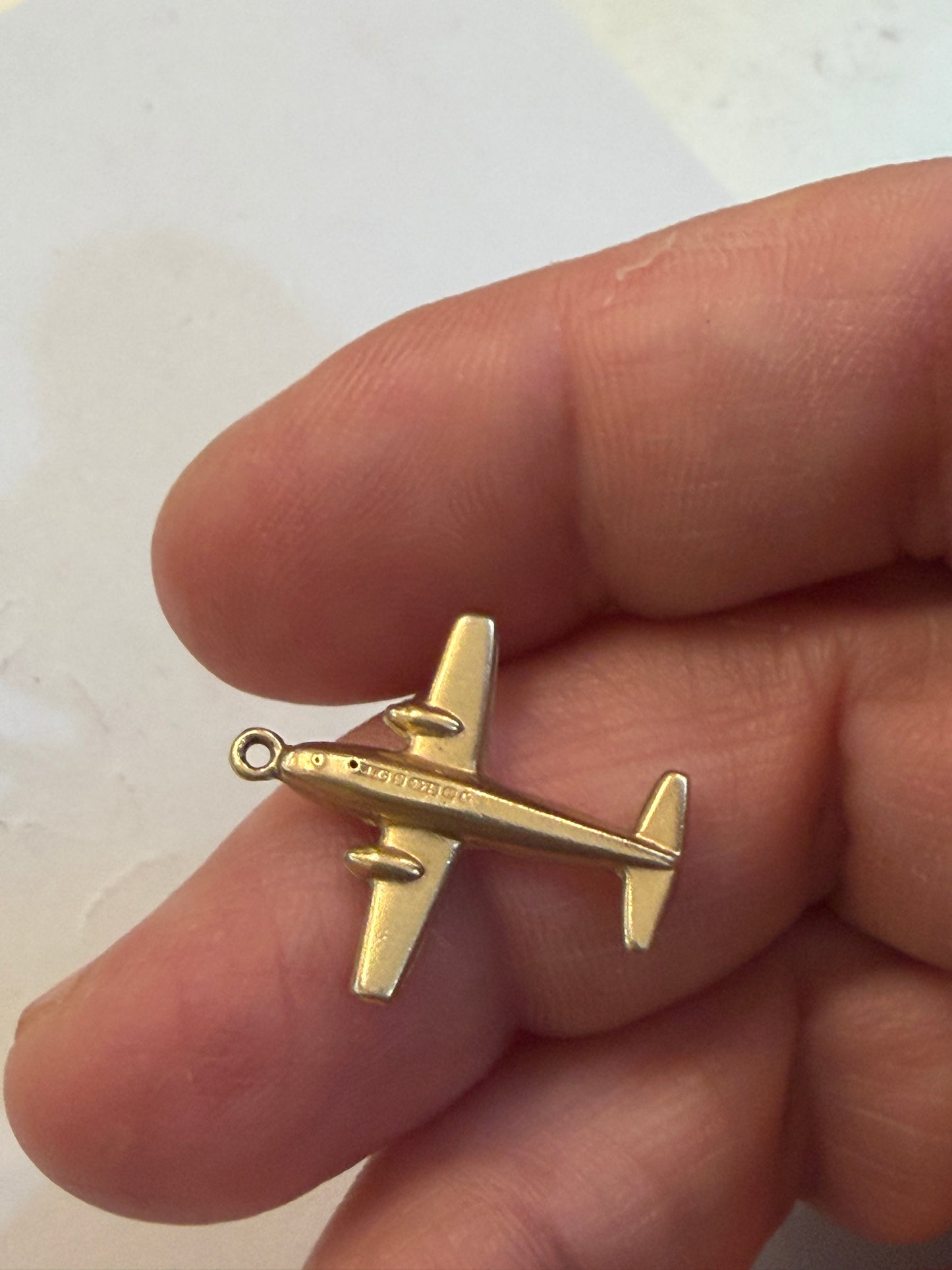 9ct vintage aeroplane charm, circa 1967 by WHc. hollow 0.64g