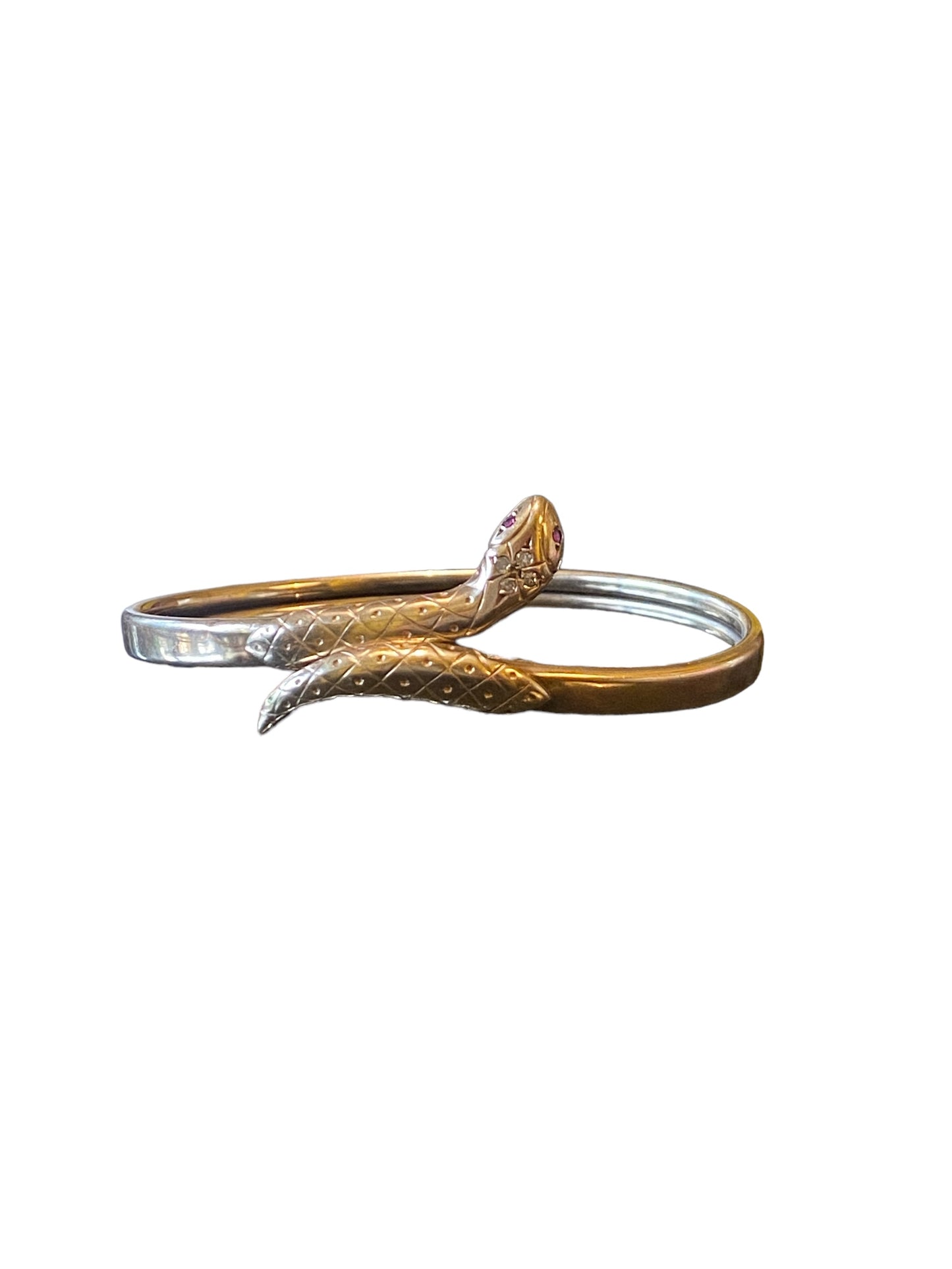 9ct vintage flexible snake bangle with diamond and ruby eyes.