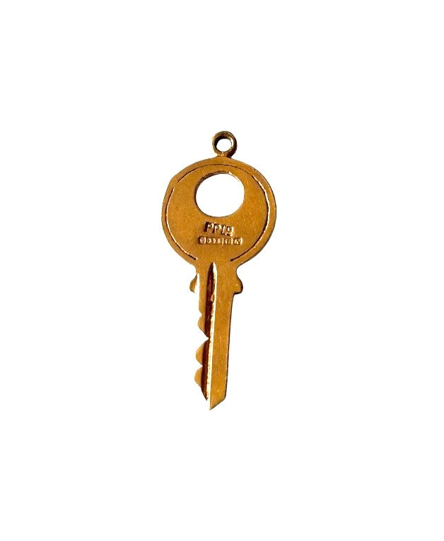 9ct vintage key charm with vyseor on the front. 1.05g circa 1987