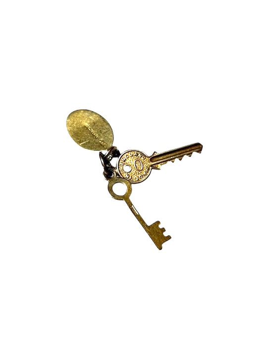 9ct vintage keys charm, with return if found tag . circa 1960s