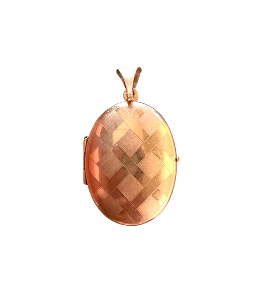 9ct contemporay design oval locket.