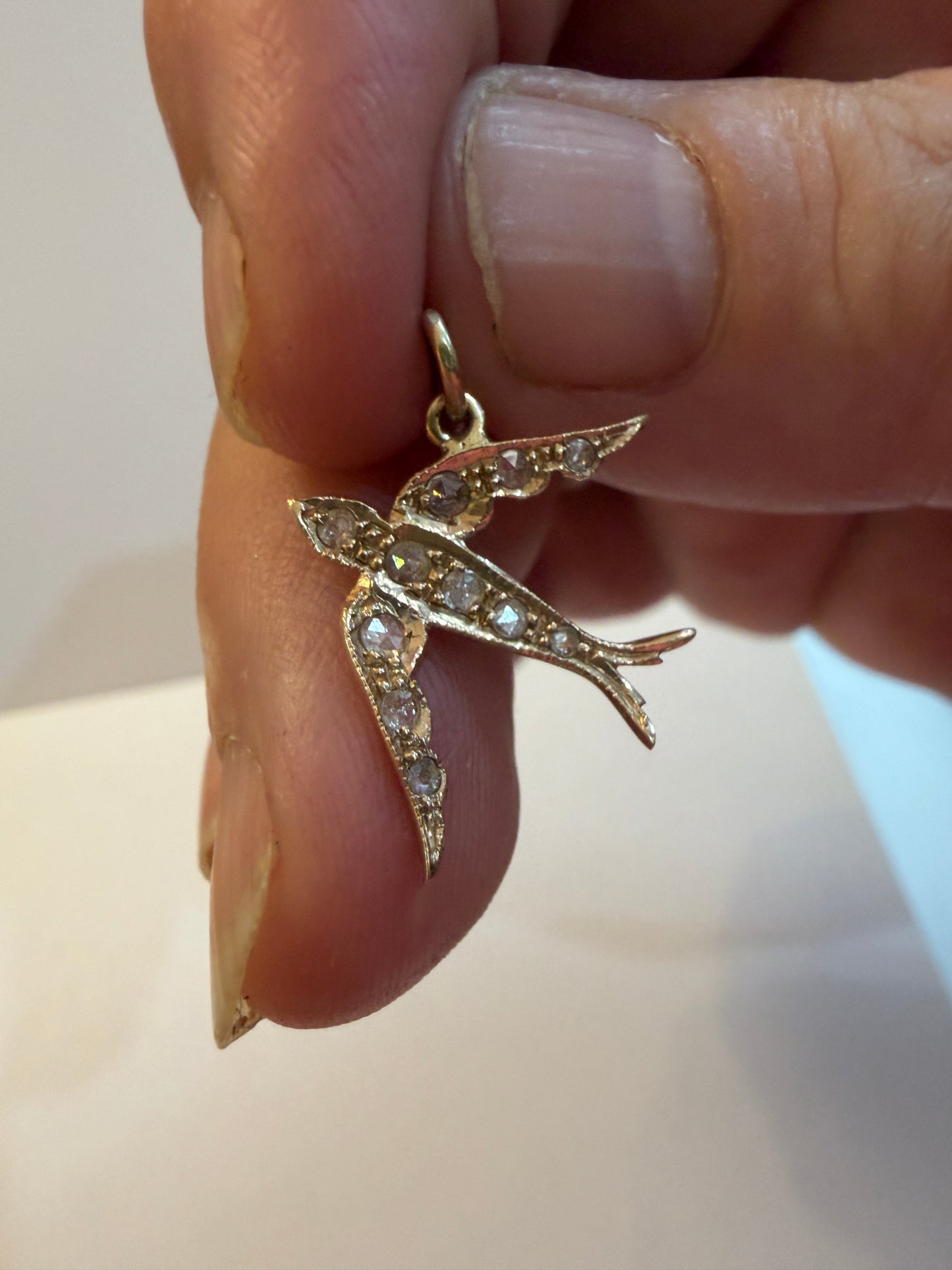 9ct vintage - preowned swallow / dove charm-pendant with rose cut diamonds.
