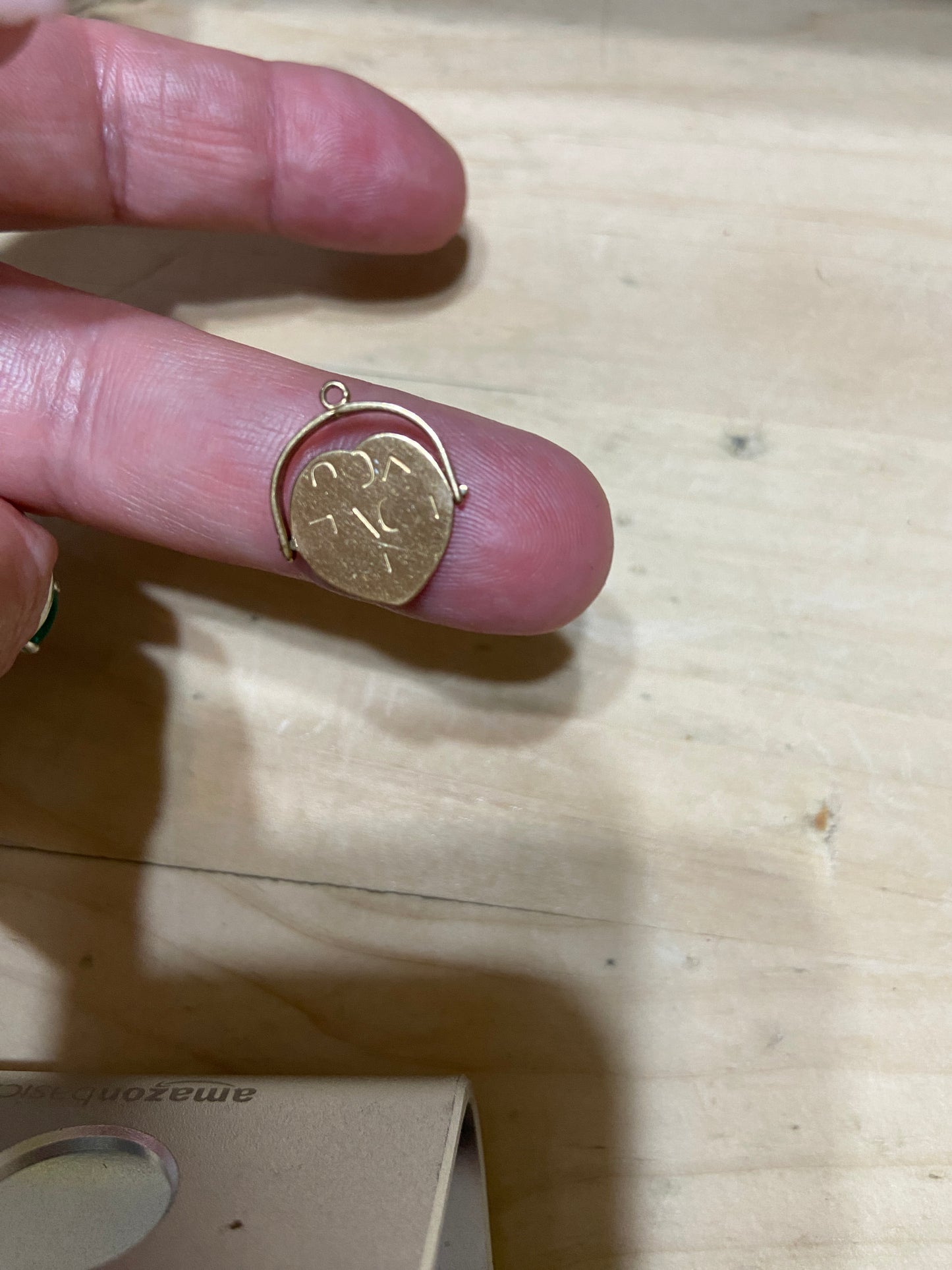 9ct vintage 'I love you' spinner in a heart shape.