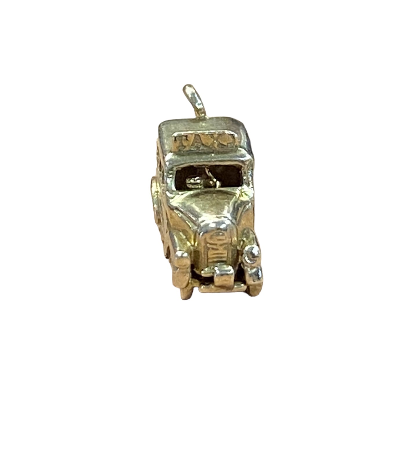 9ct vintage taxi charm opening to reveal some passengers inside circa 1963