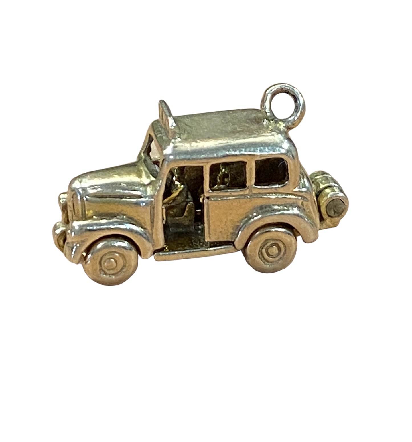 9ct vintage taxi charm opening to reveal some passengers inside circa 1963