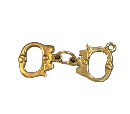 9ct vintage handcuff charm / pendant . 1.2g