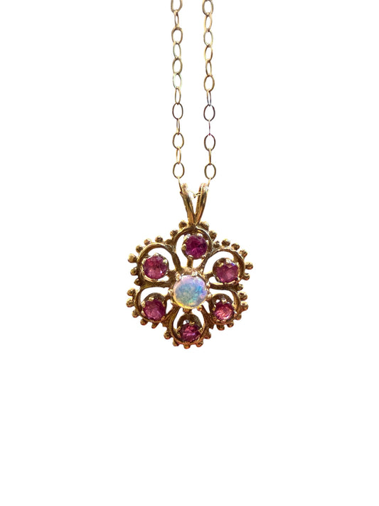 9ct vintage ruby and diamond pendant on 16 1/2 inch chain. (41cm)