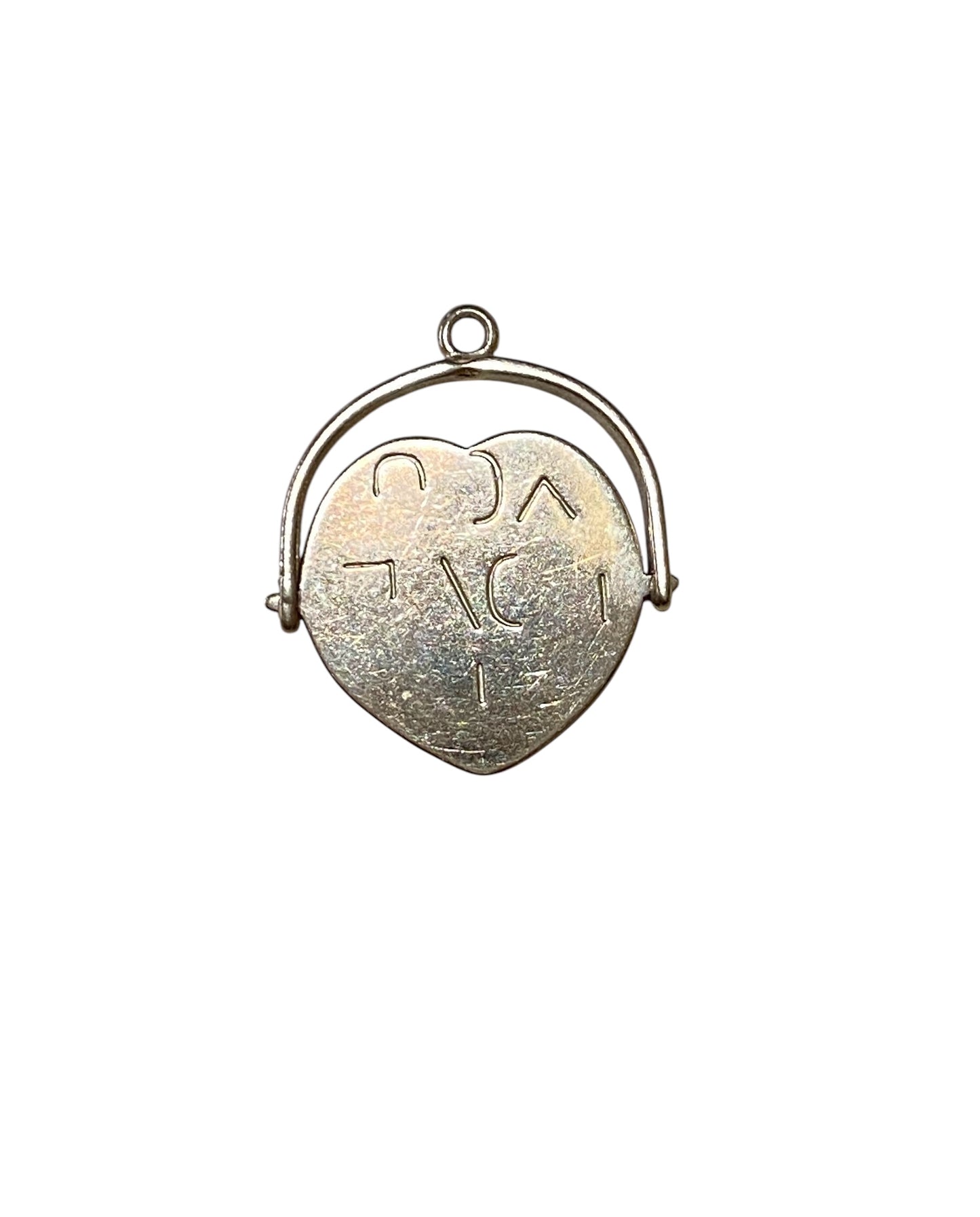 9ct vintage 'I love you' spinner in a heart shape.