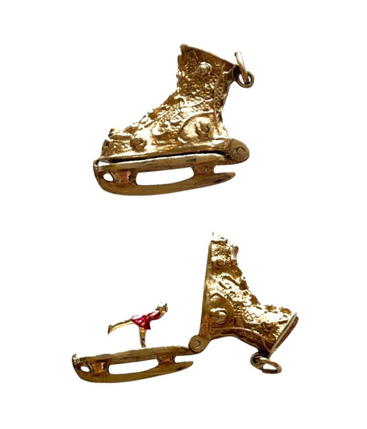 9ct vintage ice skate charm circa 1966 London with enamel skater inside. 6.2g