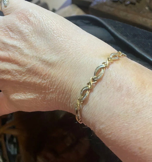 9ct vintage gold and baguette cut diamond bracelet
