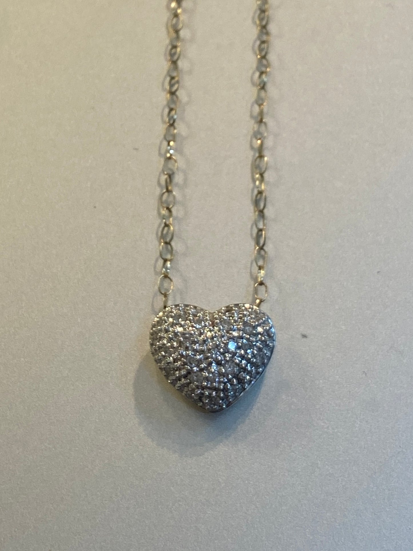 9ct pre owned diamond heart and chain. 16 inches