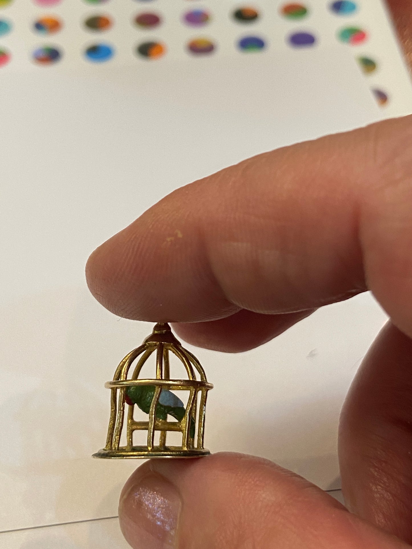 9ct vintage bird cage with an enamelled parrot inside circa 1969