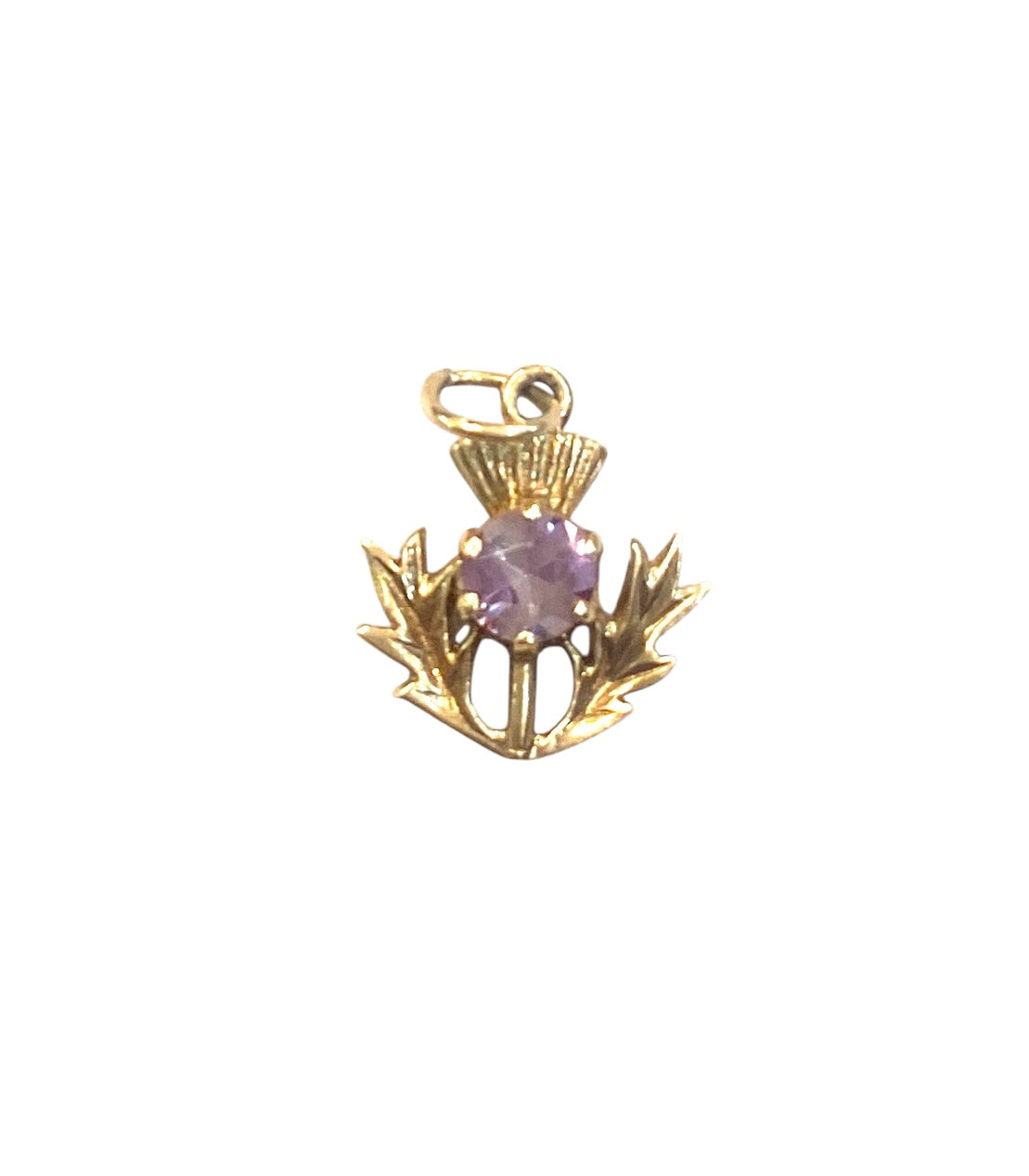 9ct vintage thistle charm with an amethyst. 1.4g
