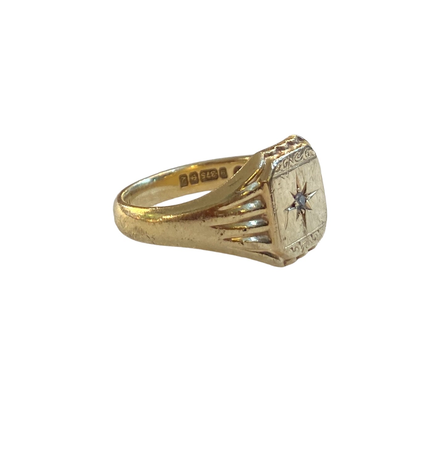 9ct vintage signet ring with a star burst diamond in the centre size R